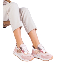 Rosa sneakers på plattformen dekorerad med glitter