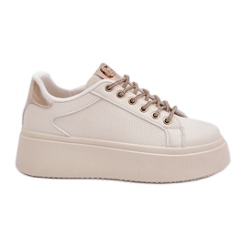 Sneakers på en plattform med dekorativa strängar beige