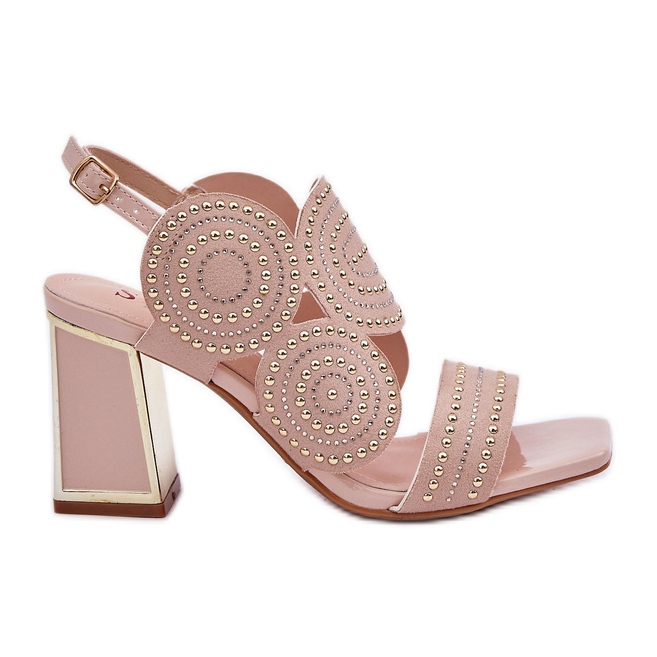 Dekorerade sandaler på stolpen beige