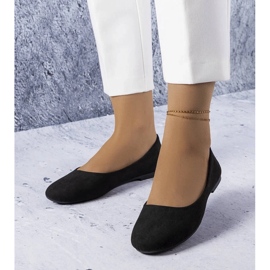 D/GMR Svarta lägenheter med läderfotbädd från Lespérance