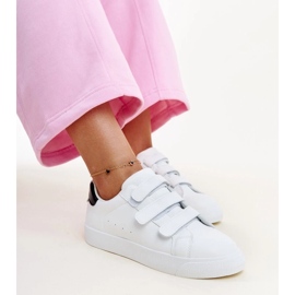 Vita och svarta kardborresneakers från Samala