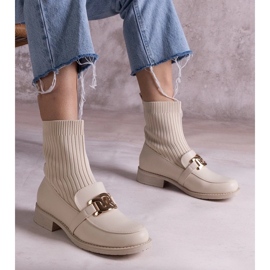 D/CEO Beige stövlar med ovandel i tyg från Krisa