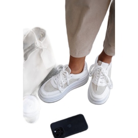 Kvinnors sneakers med ett vitt mönster