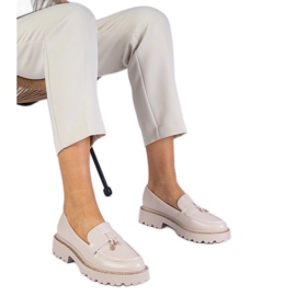 Beige mockasiner dekorerade med strass