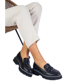 Svarta mockasiner dekorerade med strass