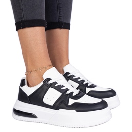 Svarta och vita damsneakers med tjock sula
