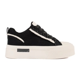 Svarta och vita plattformssneakers