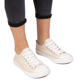 Bruna klassiska kvinnors sneakers beige
