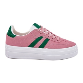 Snygga kvinnors sneakers på plattformen rosa