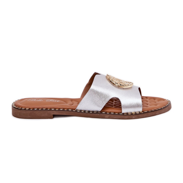 Platta kvinnors flip flops med en dekorativ silverdetalj grå