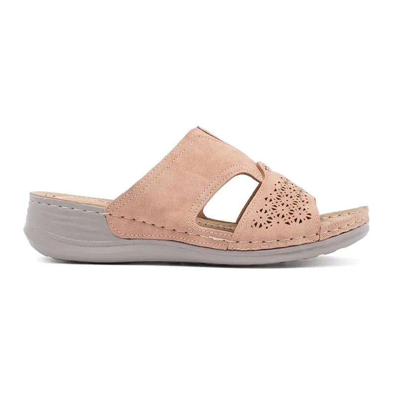 Tofflor på ett lågt kilpulverrosa