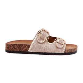 Kvinnors materialflip flops på en korkplattform med gyllene spännen