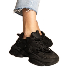 Svarta sneakers kvinnors massiva sporter