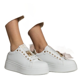 Kvinnors vita och guld sneakers dekorerade med stenar