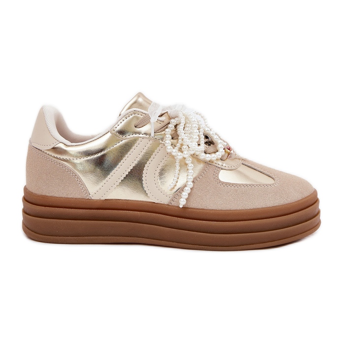 Kvinnors sneakers på plattformen med beige-gulddekorationer