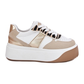 Kvinnors sneakers på en massiv plattform, djur beige-guldmönster