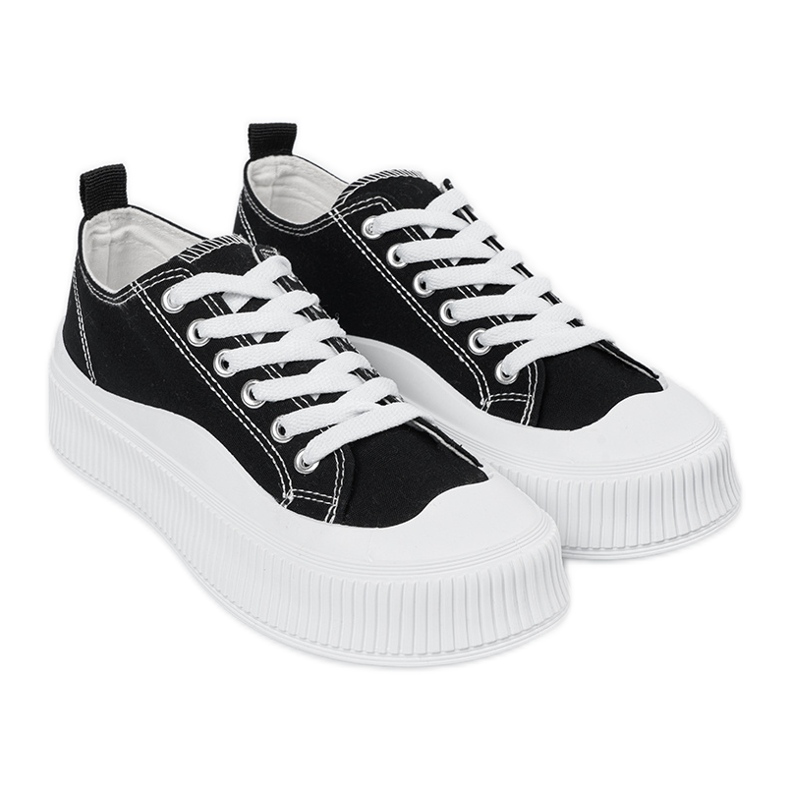 Svarta och vita sneakers med tjock sula