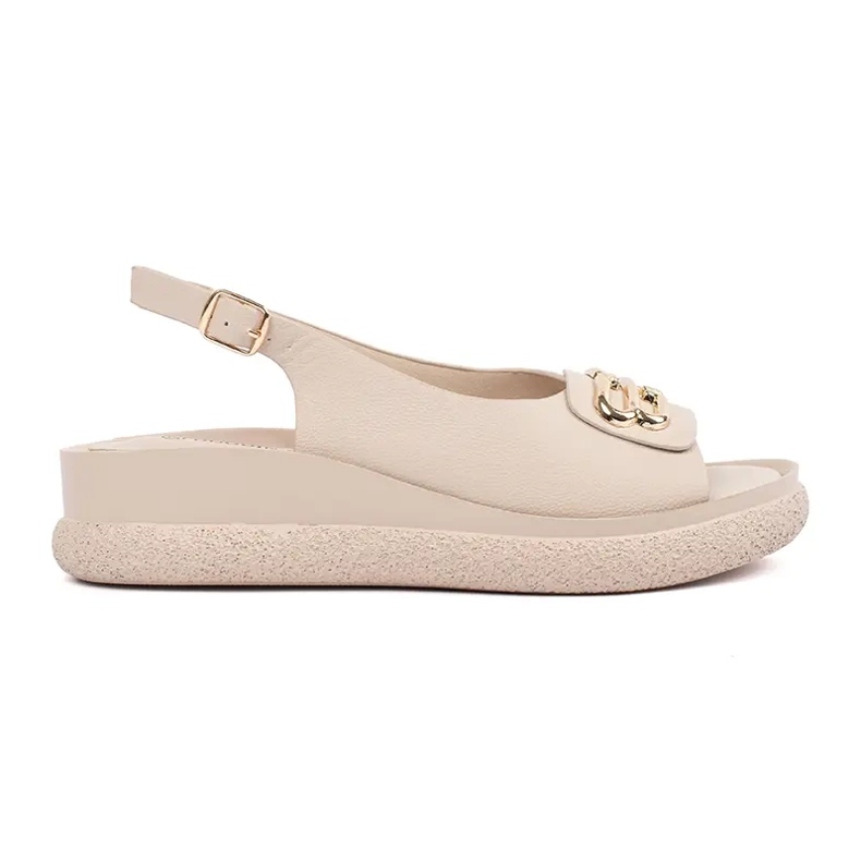 Goodin Beige platta sandaler med en prydnad