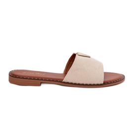 Flat -hanterade kvinnors flip flops med dekorativa detaljer beige