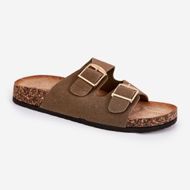 Kvinnors flip flops på en korkplattform med gyllene spännen gröna