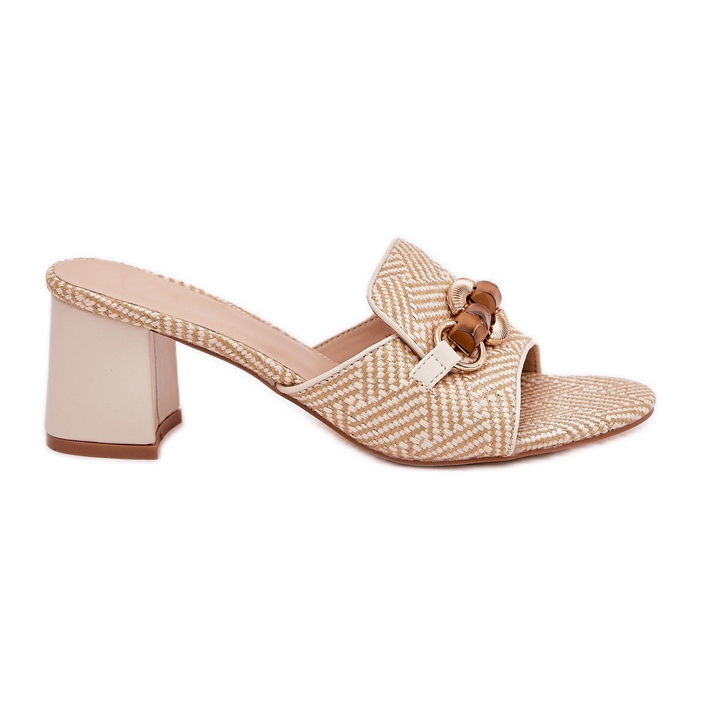 Kvinnors klackar med en beige dekoration