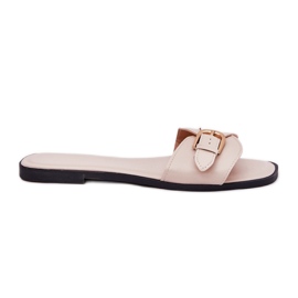 Platta kvinnors flip flops med en gyllene beige klämma
