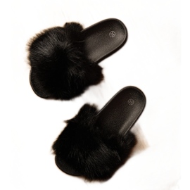 Svarta barns flip flops med päls