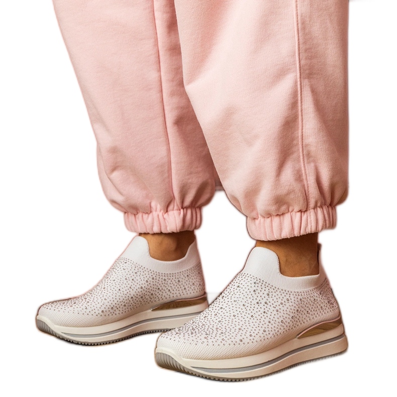 Vita kvinnors sneakers på plattformen med zirkoner