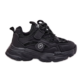 Barns sneakers på den svarta plattformen