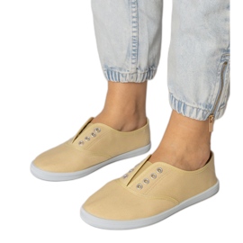 Slip-on sneakers i grått tyg