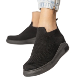 Svarta sockens sneakers infogade