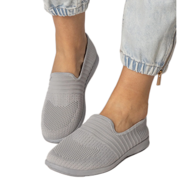 Grå kvinnors sneakers