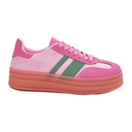 Låga sneakers på den rosa plattformen