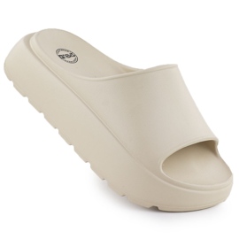 Kvinnors flip flops på en tjock plattformspool Beige News 7303