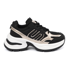 Svarta kvinnors sneakers med gyllene skär