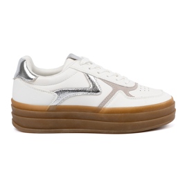 Shelvt Kvinnors vita sneakers med silverinsatser
