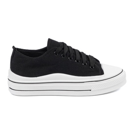 Shelvt Kvinnors svarta sneakers med en vit sula