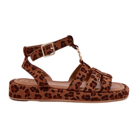 Kvinnors sandaler på plattformen med en gyllene detalj leopard brun