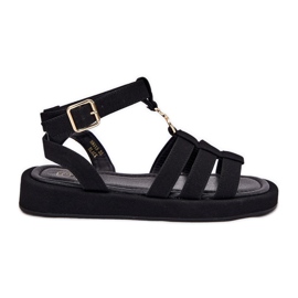 Kvinnors sandaler på plattformen med en gyllene detalj svart