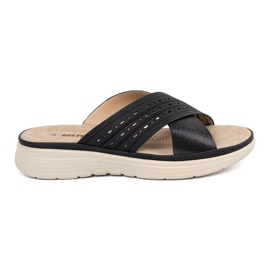 Svarta tofflor på plattformen