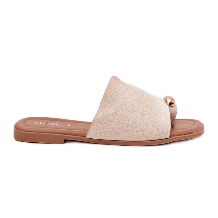 Platta kvinnors flip flops med gyllene detalj beige