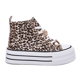 Kvinnors höga sneakers på en massiv plattform med pins leopard leopard gyllene
