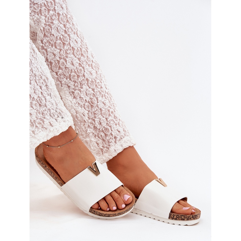 Boto Kvinnors flip flops på en korkplattform med en dekorativ vit Vessira -detalj
