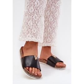 Boto Kvinnors flip flops på en korkplattform med en dekorativ detalj Black Vessira svart