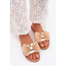 Boto Flat -hanterade kvinnors flip flops med en tyllbåge Golden Tanira gyllene