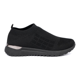 Shelvt Svart slip-on sportskor med en mesh övre delen