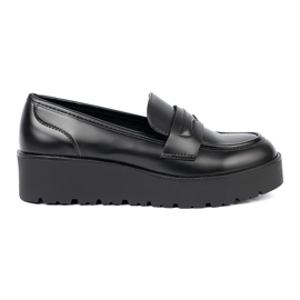 Shelvt Eleganta svarta loafers på en tjock sula