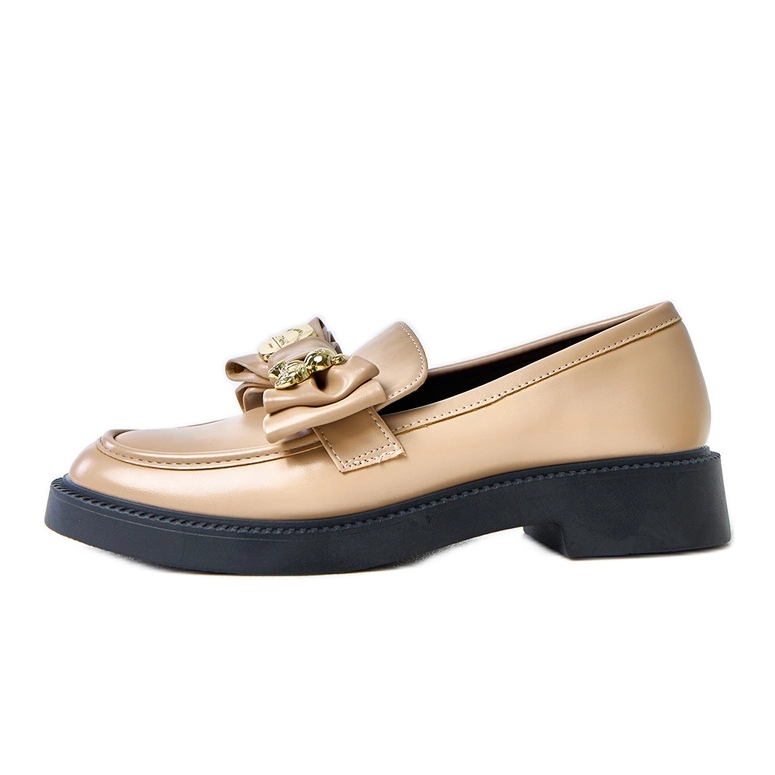 Beige loafers med en båge och teriwa björn