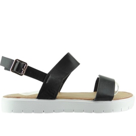 Svarta sandaler på LC-7 sportsulan