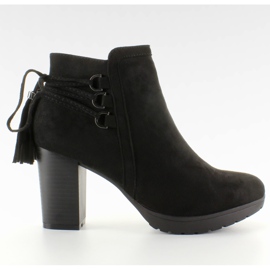 Svarta dekorativa klackar med snören